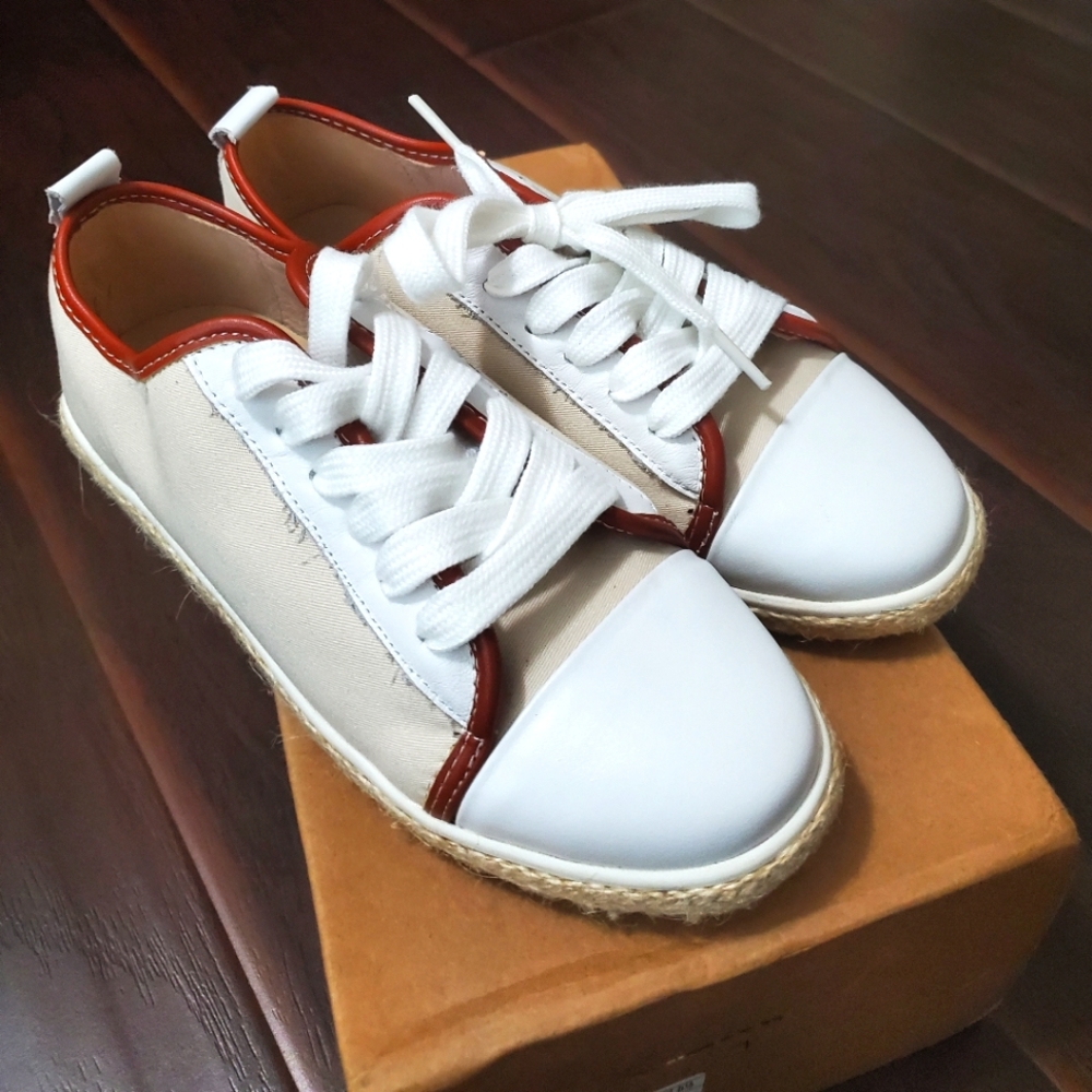 Light beige and white sneakee